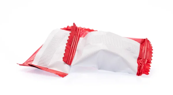Καραμέλες Σοκολάτας Πλαστική Σακούλα Που Απομονώνονται Λευκό Φόντο — Φωτογραφία Αρχείου