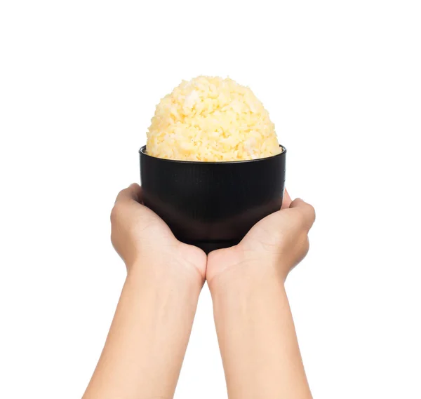 Mano Sosteniendo Una Porción Arroz Amarillo Cocido Tazón Negro Aislado — Foto de Stock