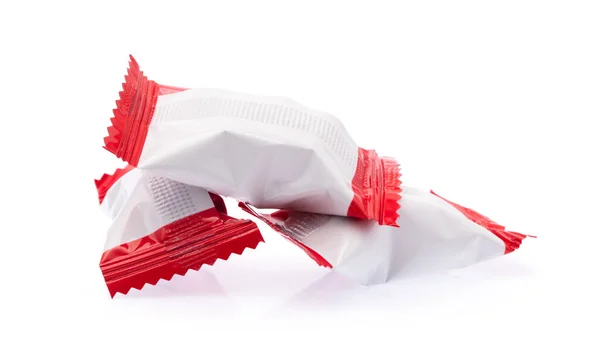 Caramelos Chocolate Bolsa Plástico Aislado Sobre Fondo Blanco —  Fotos de Stock