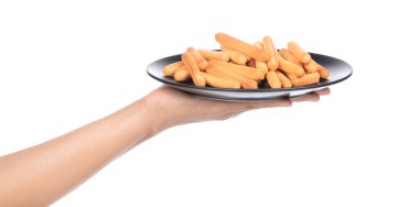 Beyaz arka planda çıtır çıtır pipet tabağı var. Bisküvi çubukları beyaz arkaplanda izole