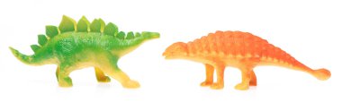 Beyaz arka plan üzerinde izole oyuncak plastik dinozor.