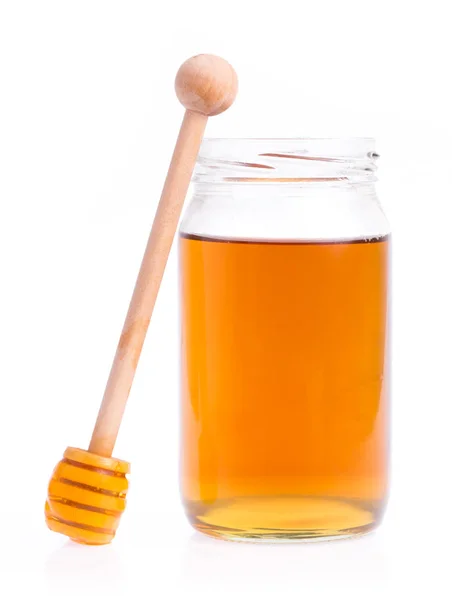 Glass Bottle Full Honey Wooden Stick White Background — Stock Photo, Image