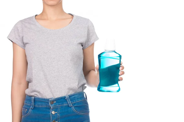 Κορίτσι Φορώντας Κενό Γκρι Shirt Τζιν Κρατά Ένα Μπουκάλι Στοματικό — Φωτογραφία Αρχείου