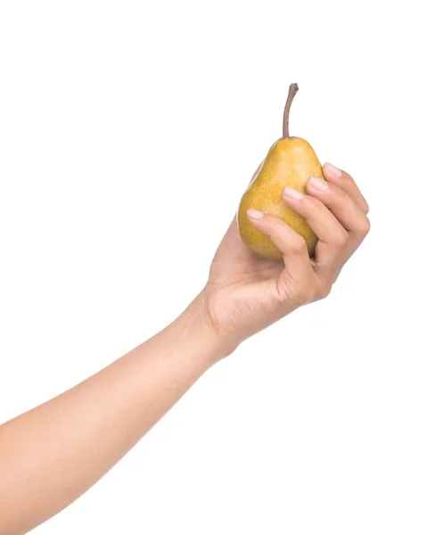 白い背景に黄色の梨を持つ手は — ストック写真