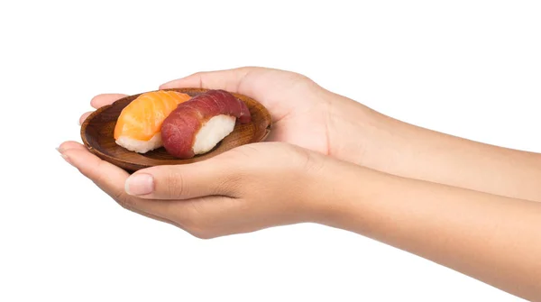 Hand Hält Frisches Sushi Auf Einer Hölzernen Schüssel Auf Weißem — Stockfoto