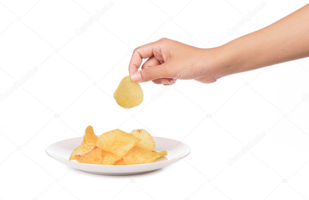 hand holding Potato chips on dish isolated on white background