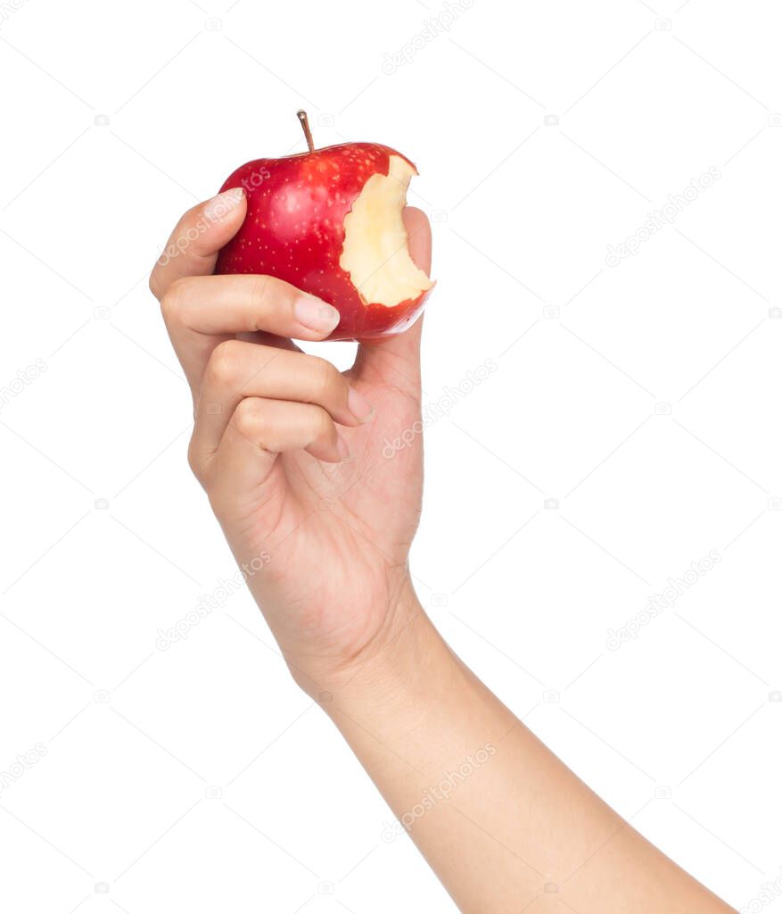 hand holding bite red apple isolated on white background