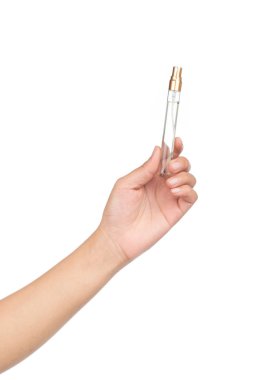 Beyaz bir arka planda el yapımı cam parfüm şişesi.