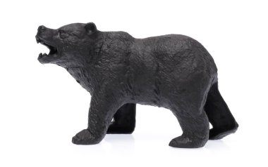 Beyaz arka planda izole edilmiş plastik oyuncak ayı.