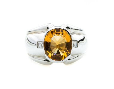 classic ring with a yellow/orange topaz stone on white background