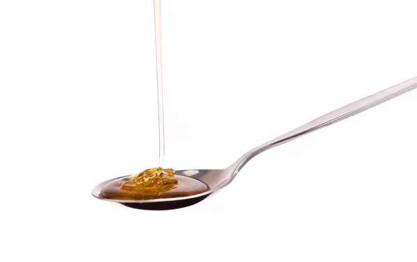 Μέλι Που Στάζει Από Ένα Κουτάλι Απομονωμένο Λευκό Φόντο — Φωτογραφία Αρχείου