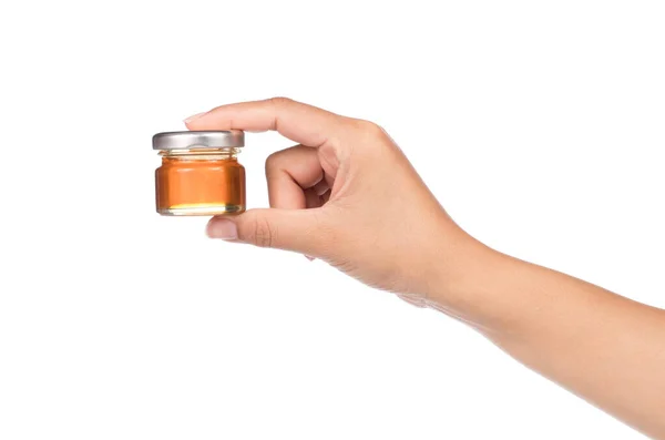 Hand Hält Honigglas Isoliert Auf Weißem Hintergrund — Stockfoto
