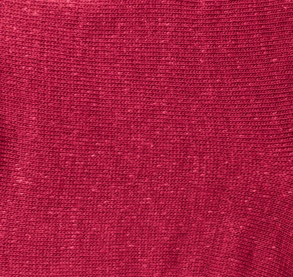 Kırmızı kumaş yüzeyinin arkaplanı 