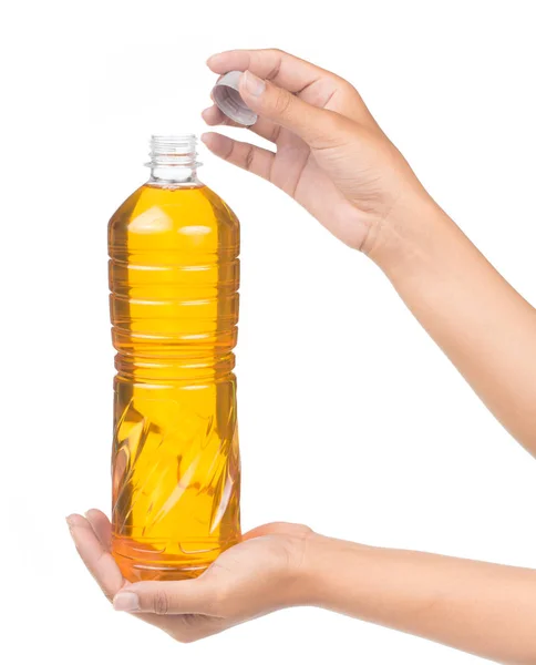 Tangan Memegang Minyak Sayur Untuk Memasak Dalam Botol Yang Terisolasi — Stok Foto