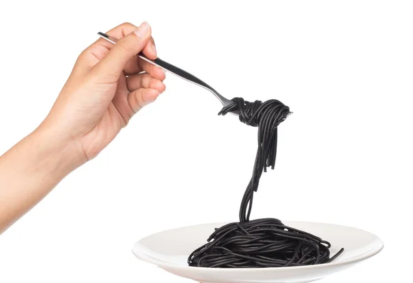 Ruční Držení Role Černé Těstoviny Špagety Vidličkou Izolované Bílém Pozadí — Stock fotografie