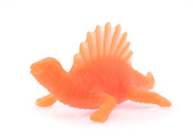 Spinosaurus made out of plastic. dinosaur toy isolated on white background