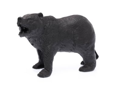 Beyaz arka planda izole edilmiş plastik oyuncak ayı.