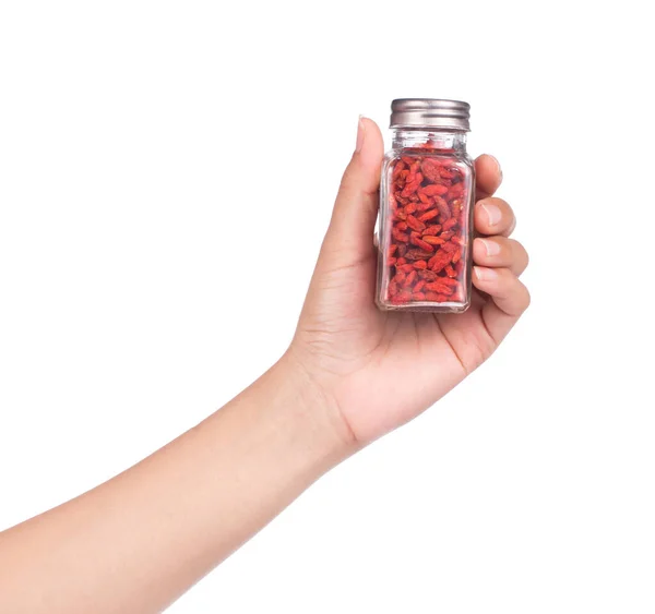 Hand Hält Flasche Goji Wolfberries Isoliert Auf Weißem Hintergrund — Stockfoto