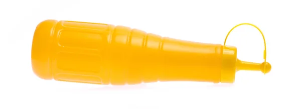 一个白色背景的黄色芥末瓶 — 图库照片