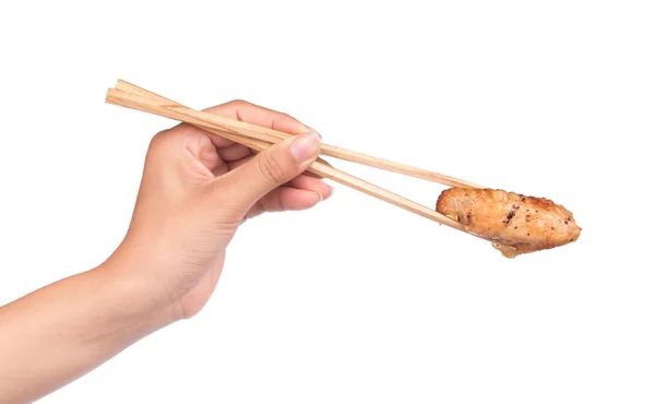 Mão Segurando Asa Frango Assado Com Pauzinhos Isolados Fundo Branco — Fotografia de Stock