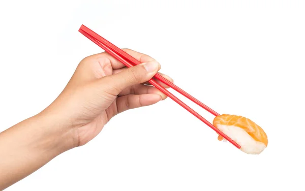 Hand Hält Lachssushi Mit Essstäbchen Auf Weißem Hintergrund — Stockfoto