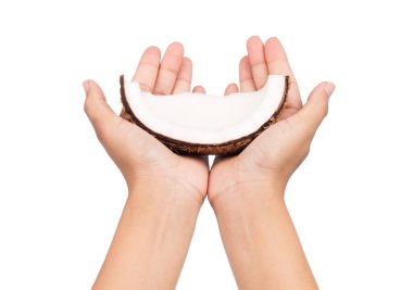 Hindistan cevizi tutarken Eski kahverengi beyaz arka planda izole