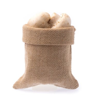 Çuvaldaki Şampiyon Mantarı beyaz arka planda izole edildi