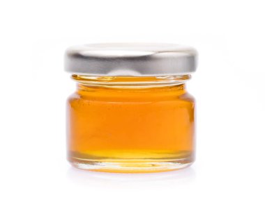 Bal kavanozu beyaz arkaplanda izole