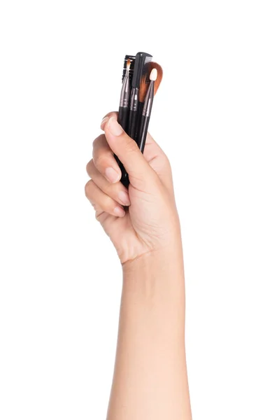 Mão Pessoa Segurando Pincéis Maquiagem Isolado Fundo Branco — Fotografia de Stock