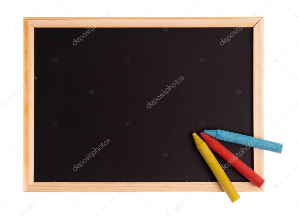 blank blackboard with colored chalks isolated on white background