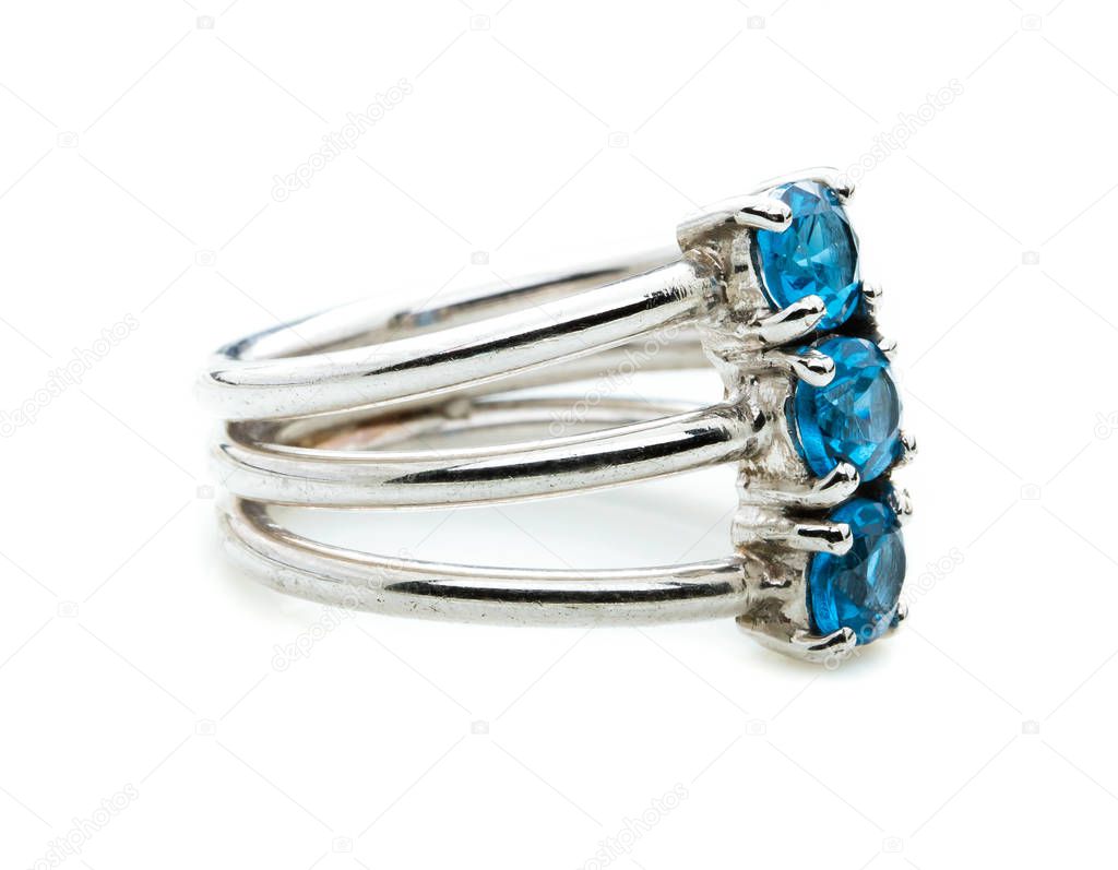 sapphire ring on white background
