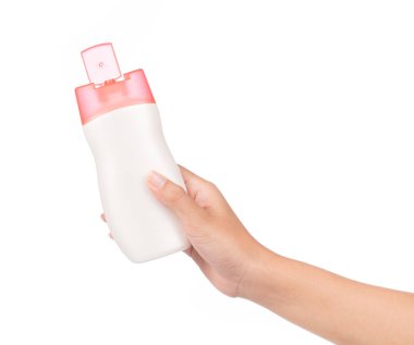 Hand holding bottle lotion isolated on white background clipart