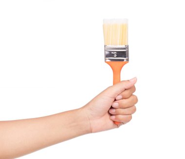 Beyaz arka plan üzerinde izole boya fırçası tutan el