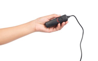 Beyaz arkaplanda izole edilmiş DSLR kamerasının uzaktan kumanda panjur anahtarı..