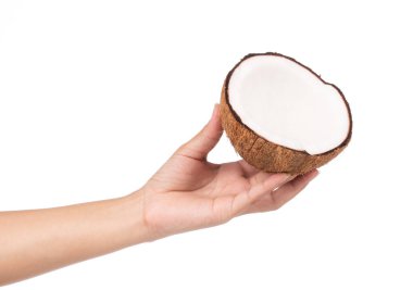 Hindistan cevizi tutarken Eski kahverengi beyaz arka planda izole