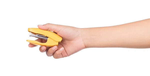 hand holding staple remover isolated on white background