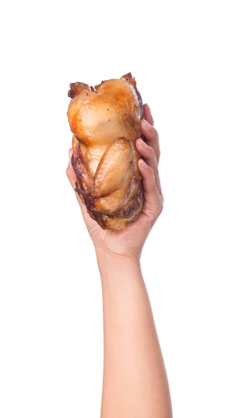 手拿着用白色背景隔开的烤鸡 — 图库照片