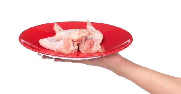 Mano Sosteniendo Raw Chicken Wings Meaton Plato Aislado Sobre Fondo —  Fotos de Stock