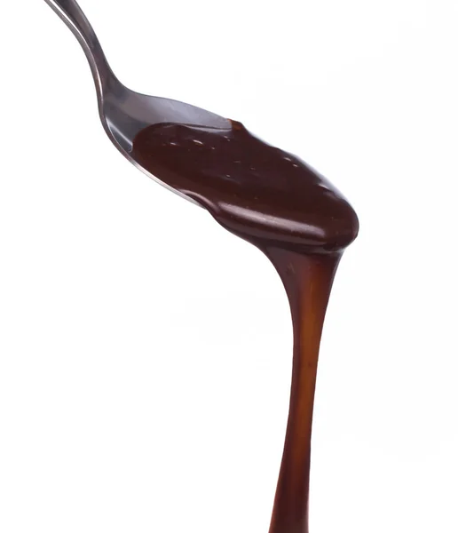 Gotejamento Chocolate Uma Colher Isolada Fundo Branco — Fotografia de Stock