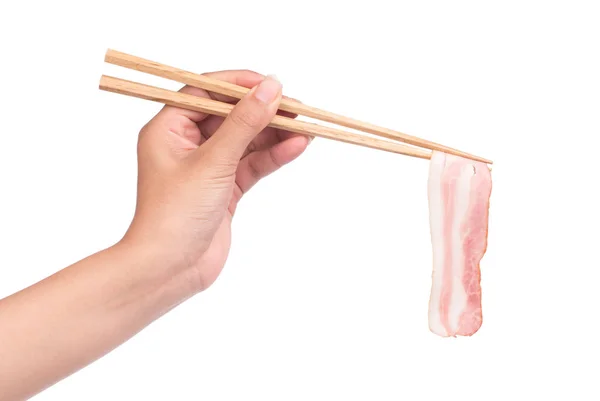 Mão Segurando Pauzinhos Comendo Bacon Isolado Fundo Branco — Fotografia de Stock