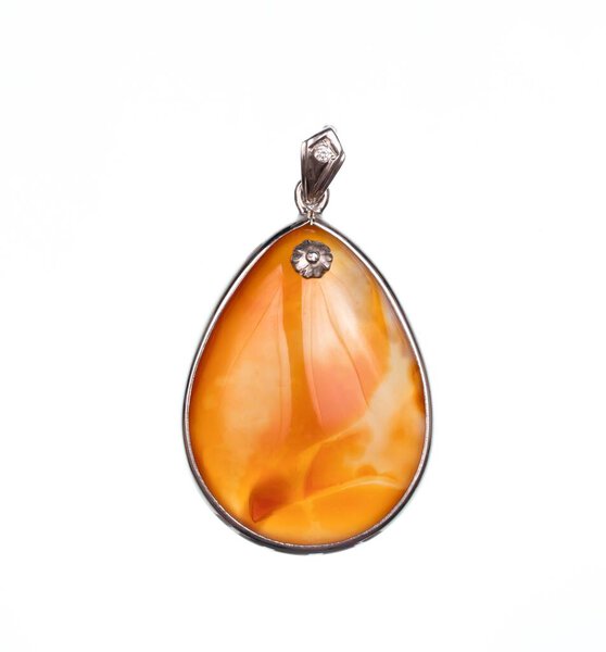 beautiful amber stone isolated on white background