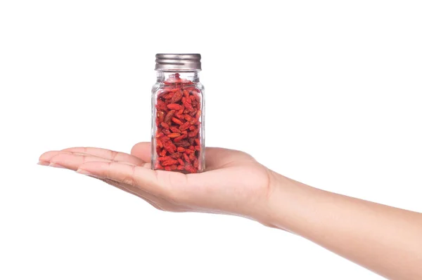 Hand Hält Flasche Goji Wolfberries Isoliert Auf Weißem Hintergrund — Stockfoto