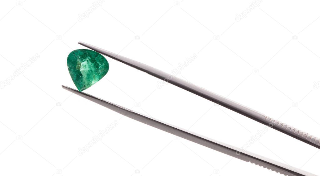 emerald gemstone isolated on white background
