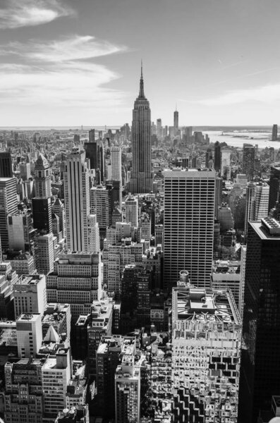 Black and white aerial view of Manhattan and the Empire State Building from Top of the Rock in a sunny day, New York, USA