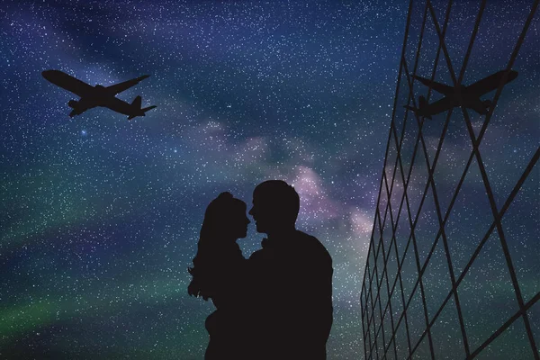 Lovers in airport at night — Stock Vector