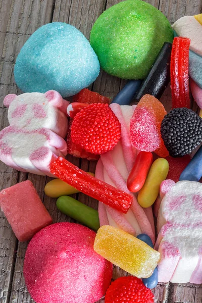 Sweets and candies with colorful backgrounds — Stock Photo, Image