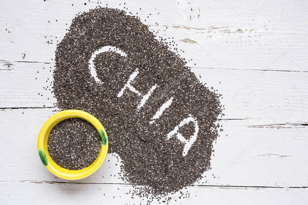 Chia seed on wooden board