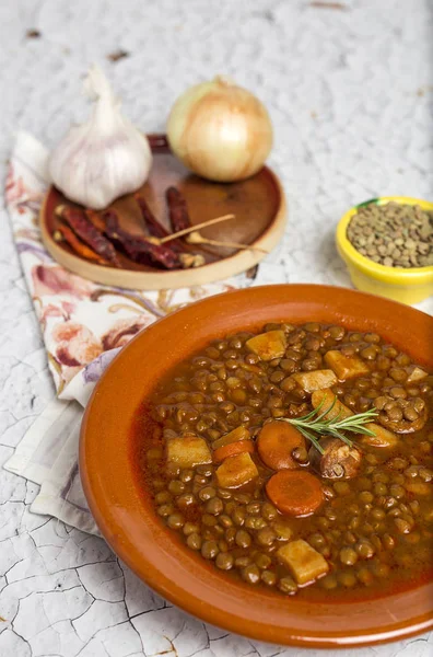 Stew of lentils with chorizo and pork — Stock Photo, Image