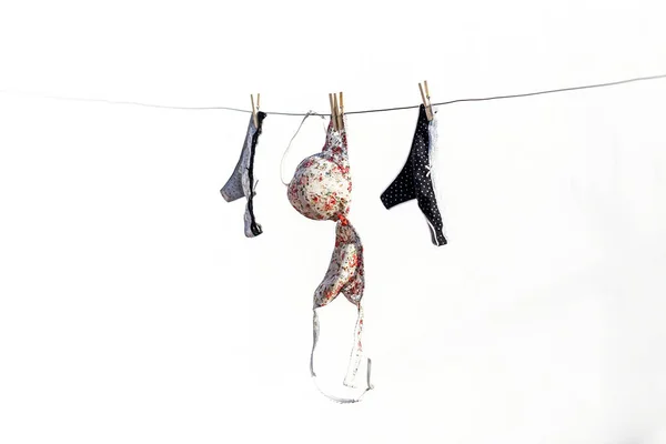 Lingerie panties and bra hanging on a terrace — Stock Photo, Image