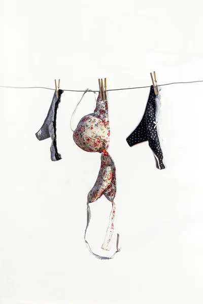 Lingerie panties and bra hanging on a terrace — Stock Photo, Image